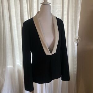 Black women’s suit jacket with unique white collar and one hook closure